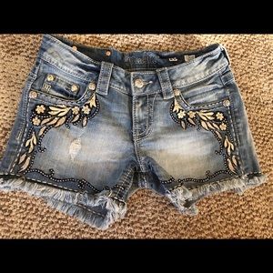 Miss Me Shorts. Size 26. Frayed bottom design.